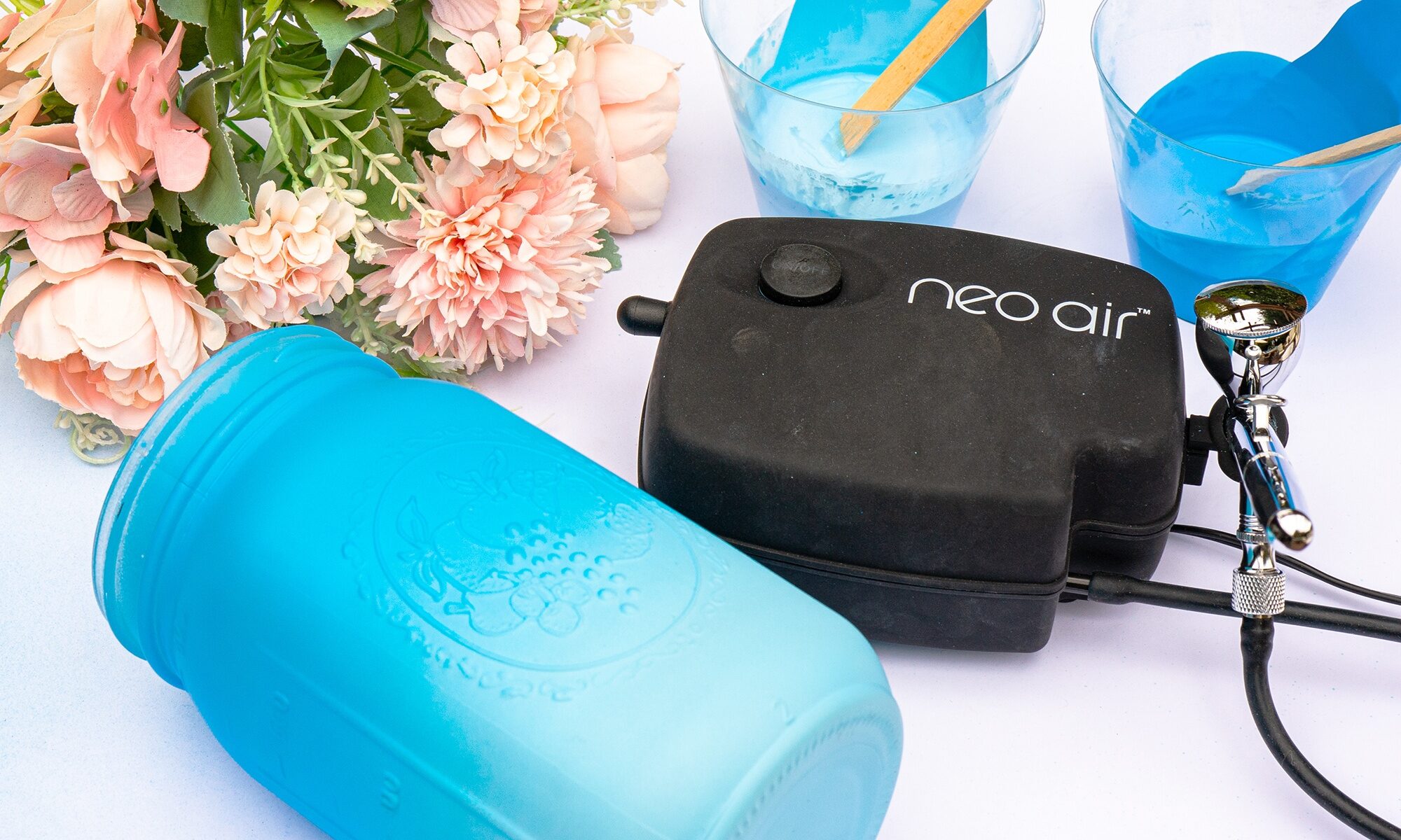 blue airbrushed ombre mason jar project with airbrush and compressor